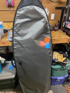 5’7 chili volume 2 with fins and board bag