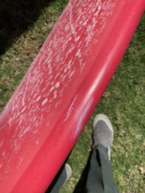 5’7 chili volume 2 with fins and board bag